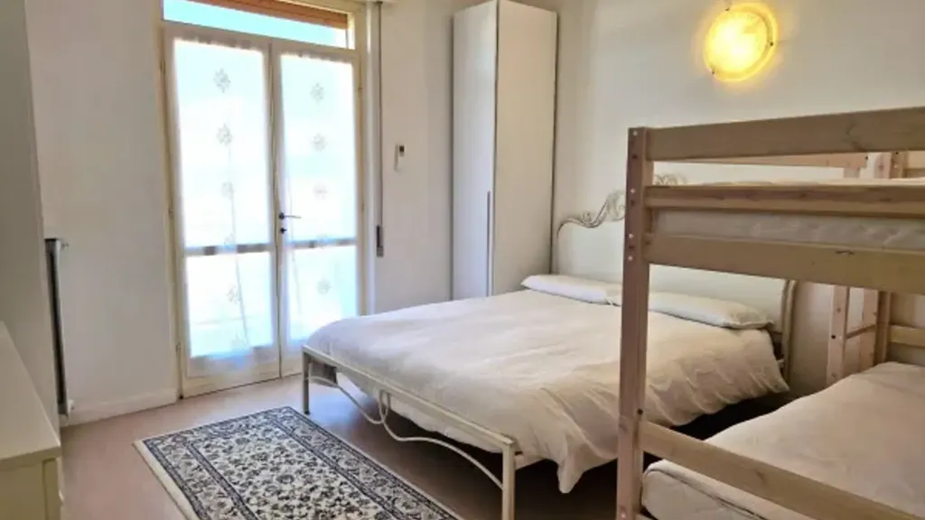Camere da letto - Trilocale with Lake View in Sirmione