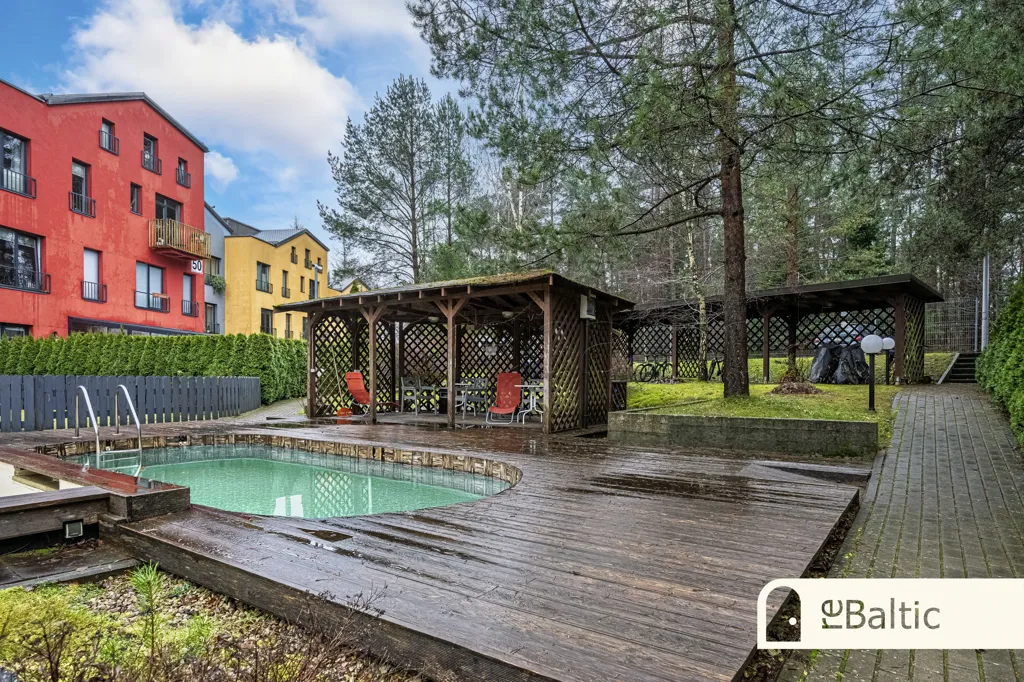 Piscine - Two-Storey Apartment with Fireplace in Burbiškės
