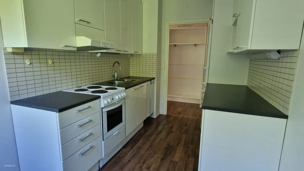 Kitchen - Bright Apartment with Balcony in Lahti