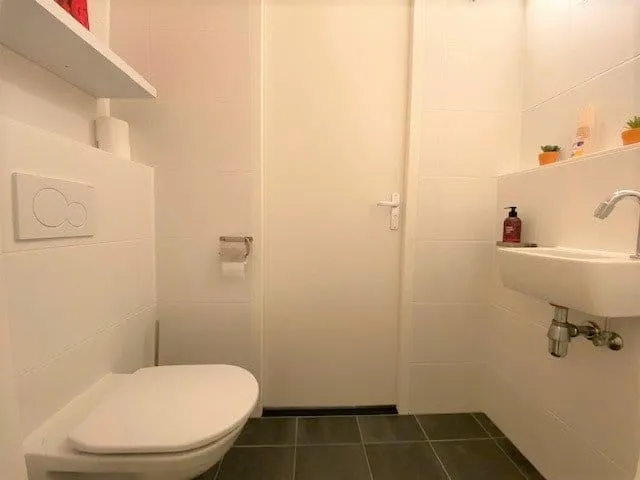 Bathrooms - Modern Apartment with Balcony in Rotterdam Centre
