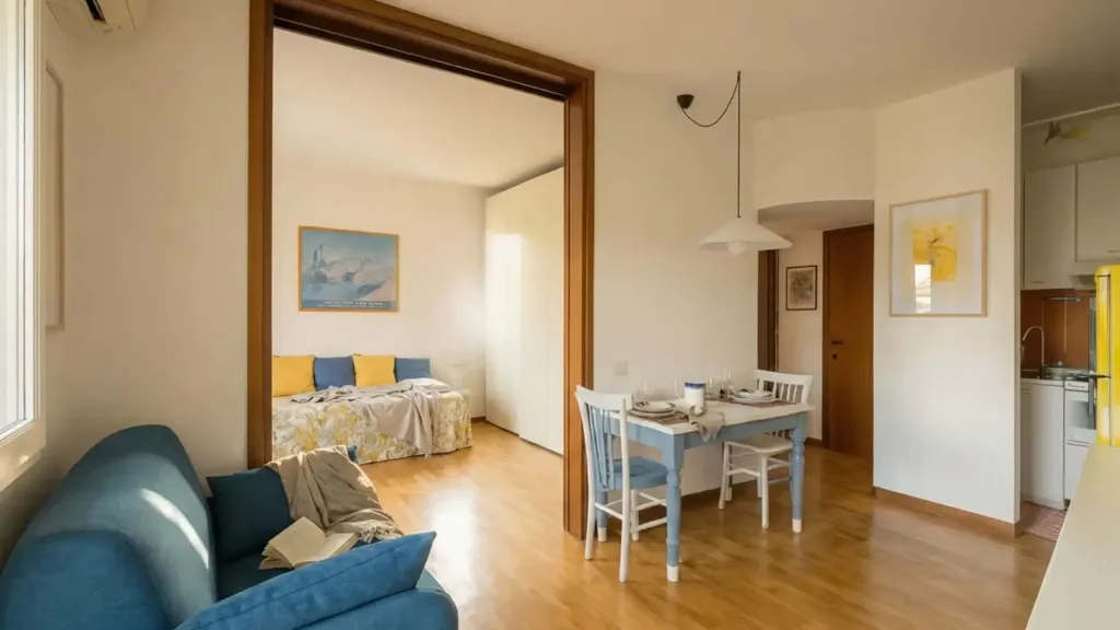 Living Room - Studio Apartment with Balcony in Milan