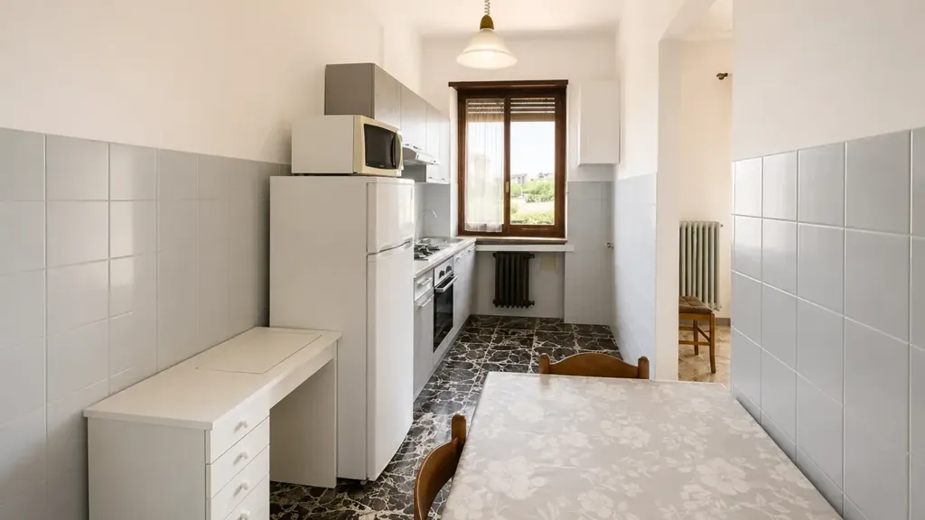 Kitchen - Spacious Apartment with Private Garden in Druento