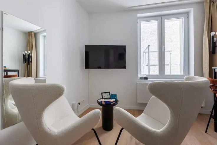 Séjour - Appartement 1BR avec Rendement Immédiat au Centre de Bruxelles