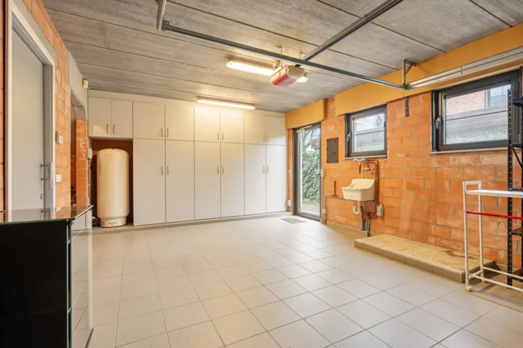 Garage - Architectural U-Form Villa with Garden in Geel