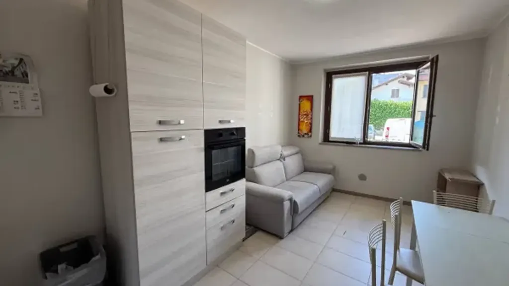 Séjour - Rustic Bilocale with Private Garden in Turate