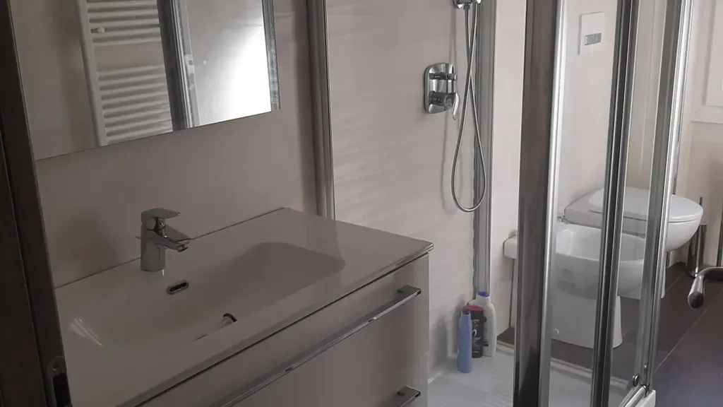 Bathrooms - Modernised Apartment with Balconies in Loano