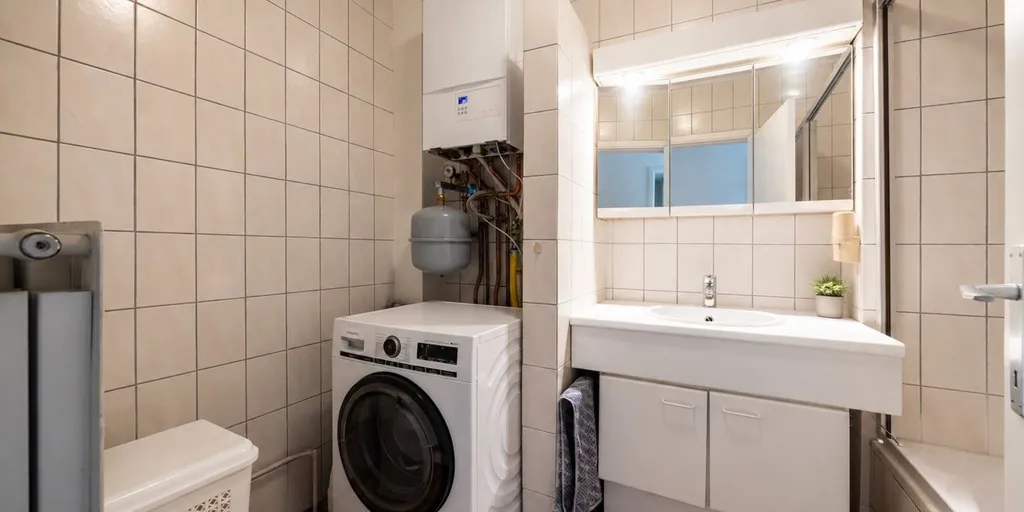Buanderie - Appartement avec Terrasse et Garage à Schoten