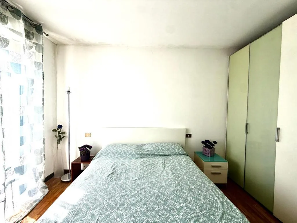 Camere da letto - Three-bedroom Apartment with Balcony in Brescia