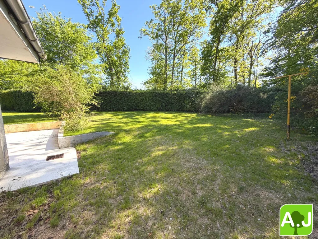 Jardin - Maison Traditionnelle avec Jardin près d'Évreux