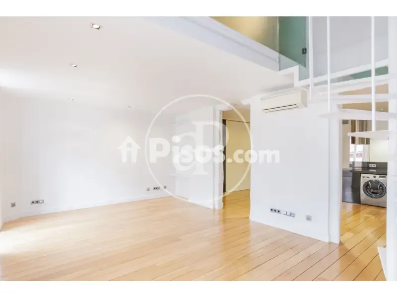 Living Room - Modern Apartment with Balcony Views in Madrid Centre
