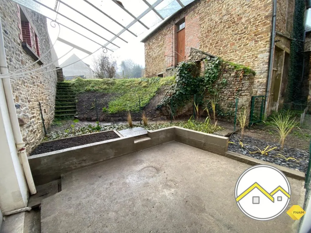 Jardin - Appartement 2 Pièces à Martigné-Ferchaud