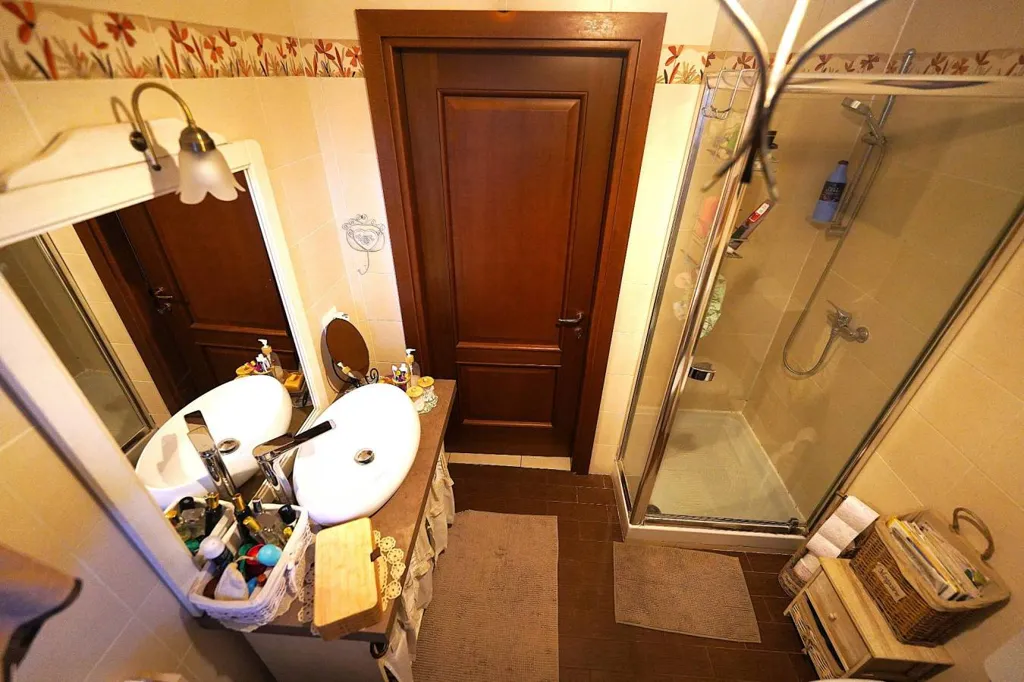 Salles de bain - Trilocale with Private Garden in La Loggia