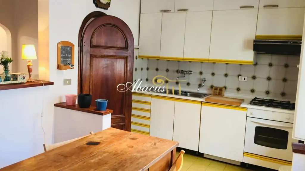 Kitchen - Historic Apartment with Piazza View in Florence