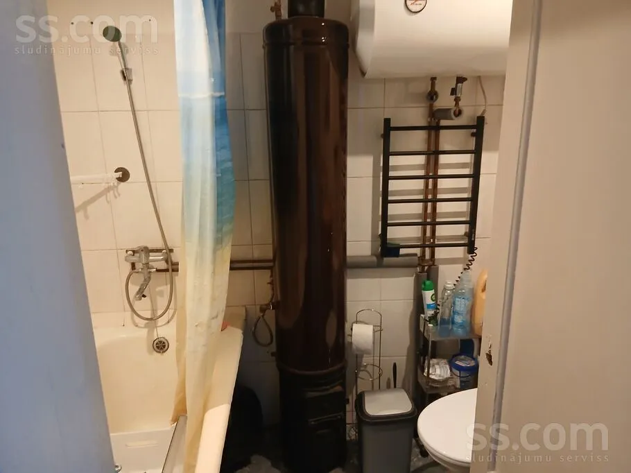 Salles de bain - Two-Bedroom Apartment with Fireplace in Griškāni