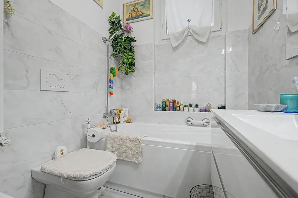Bathrooms - Rear-Accessed Apartment with Parking in Milan