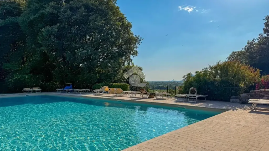 Piscina - Elegant Apartment with Pool in Calvagese della Riviera