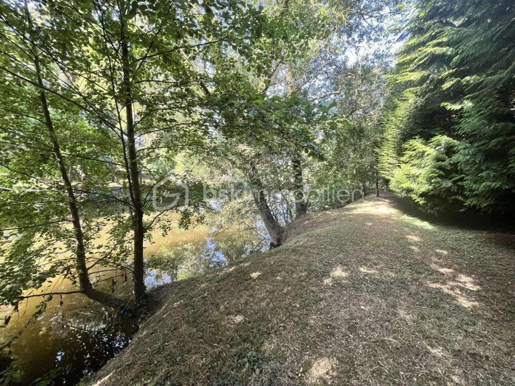 Giardino - Exceptional Plot with River Access in Montaigu Centre