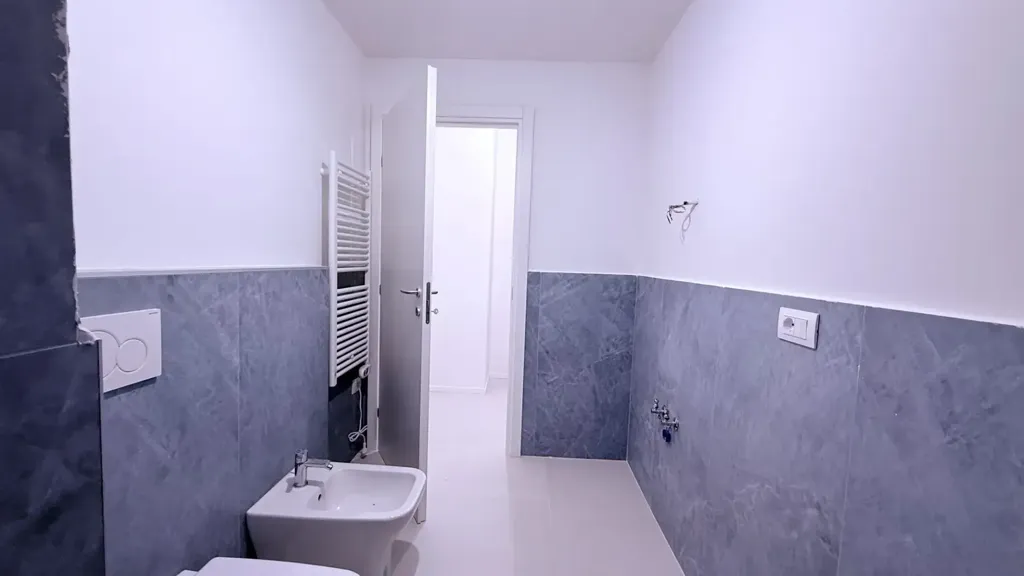 Bathrooms - Modern Apartment with Garden View in Bologna
