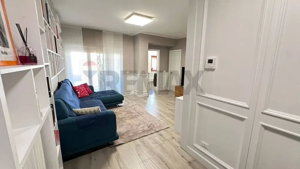 Living Room - Modern Apartment with Balcony in Cosenza