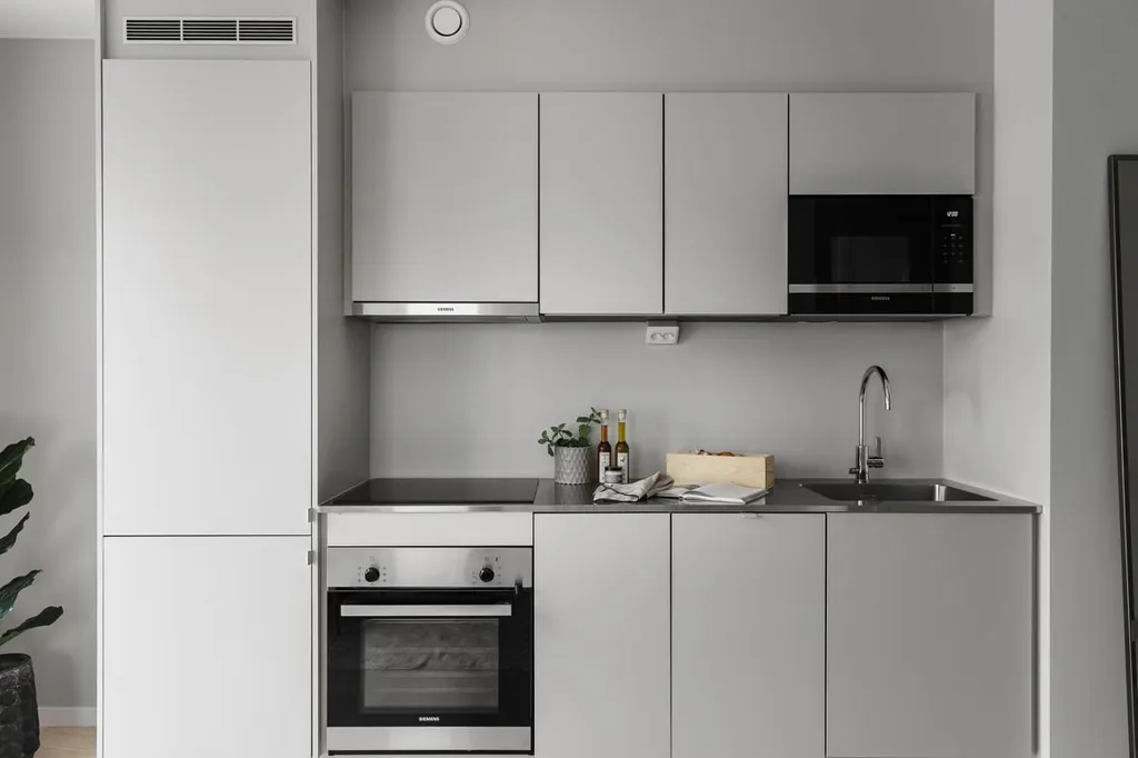 Cuisine - Apartment with Balcony and Garden View in Malmö