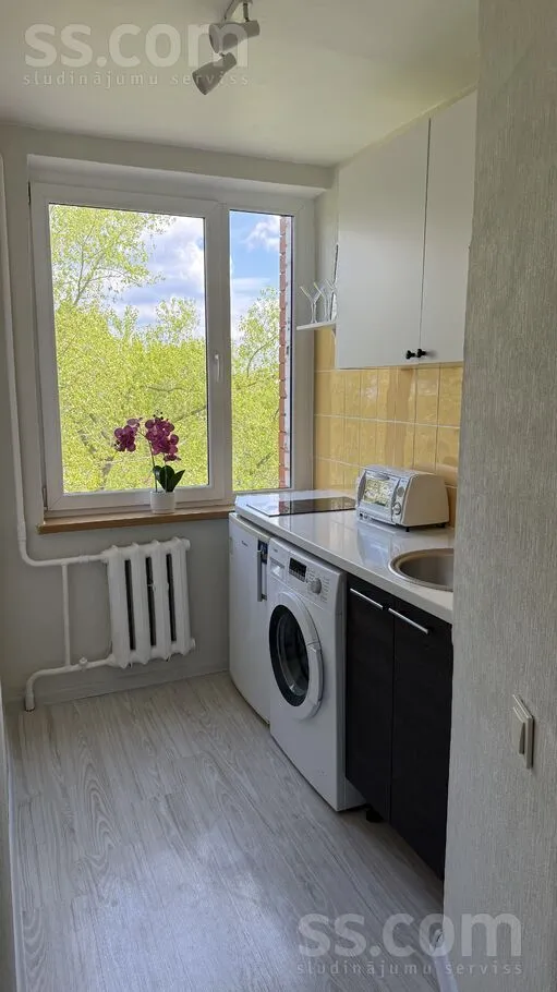 Buanderie - 1-Bedroom Flat with City View in Dzirciems