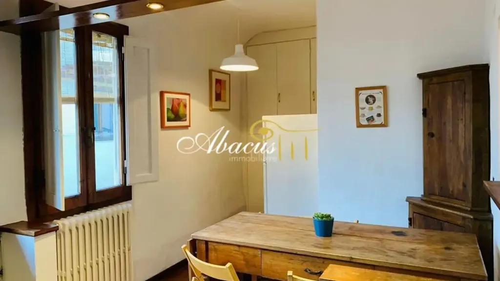 Dining Room - Historic Apartment with Piazza View in Florence
