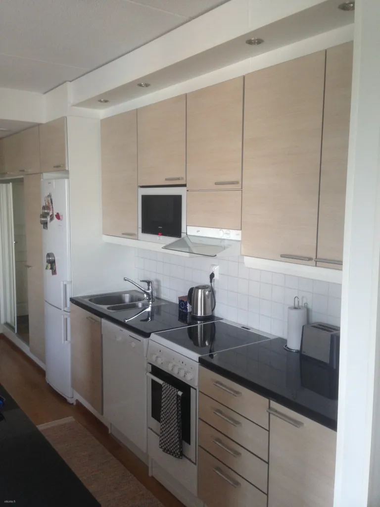 Kitchen - Bright Penthouse with Sauna in Oulu