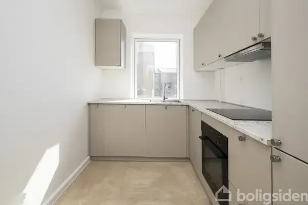 Köök - Apartment with Garden Access in Aalborg
