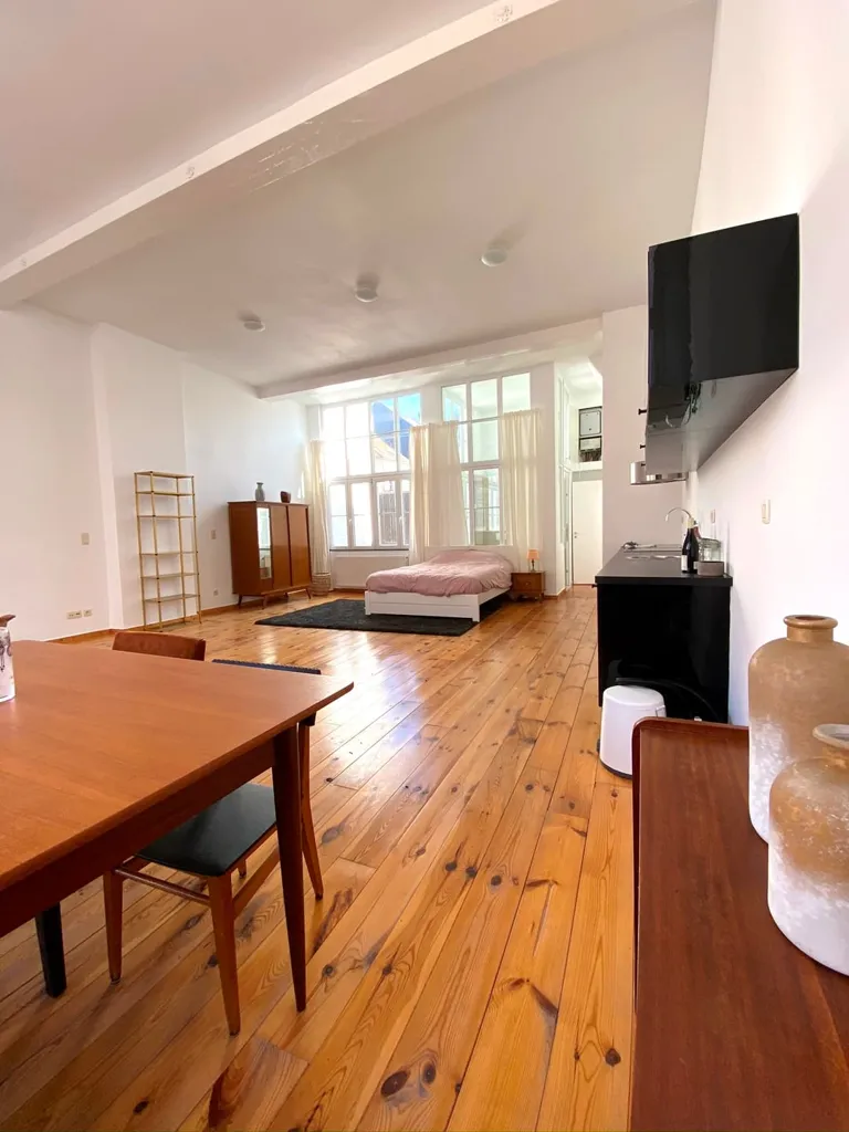 Söögituba - 1BR Loft with Large Windows in Saint-Gilles