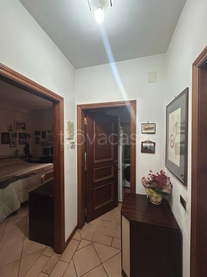 Esik - Ground Floor Apartment with Garden in Passignano