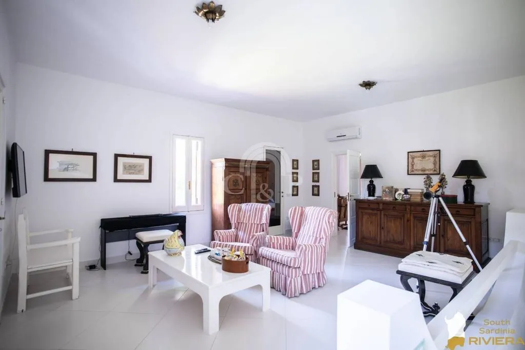 Séjour - Villa with Garden in Is Morus, Pula