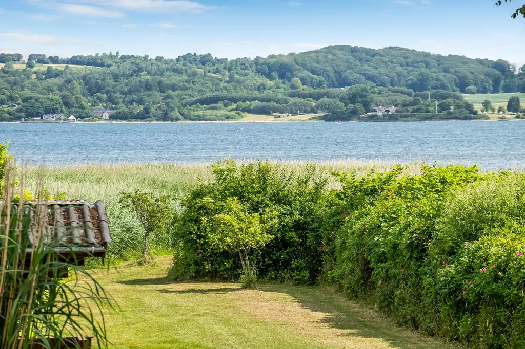 Jardín - Vacation Home with Waterfront View in Sellerup Strand