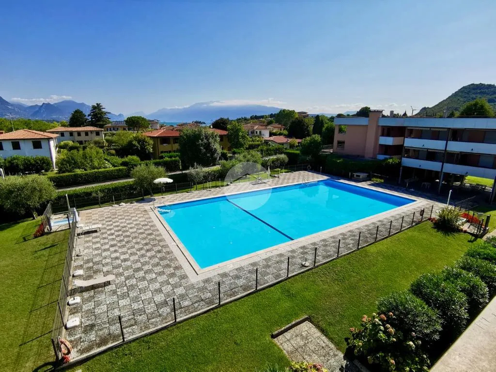 Piscine - Apartment with Pool View in Manerba del Garda