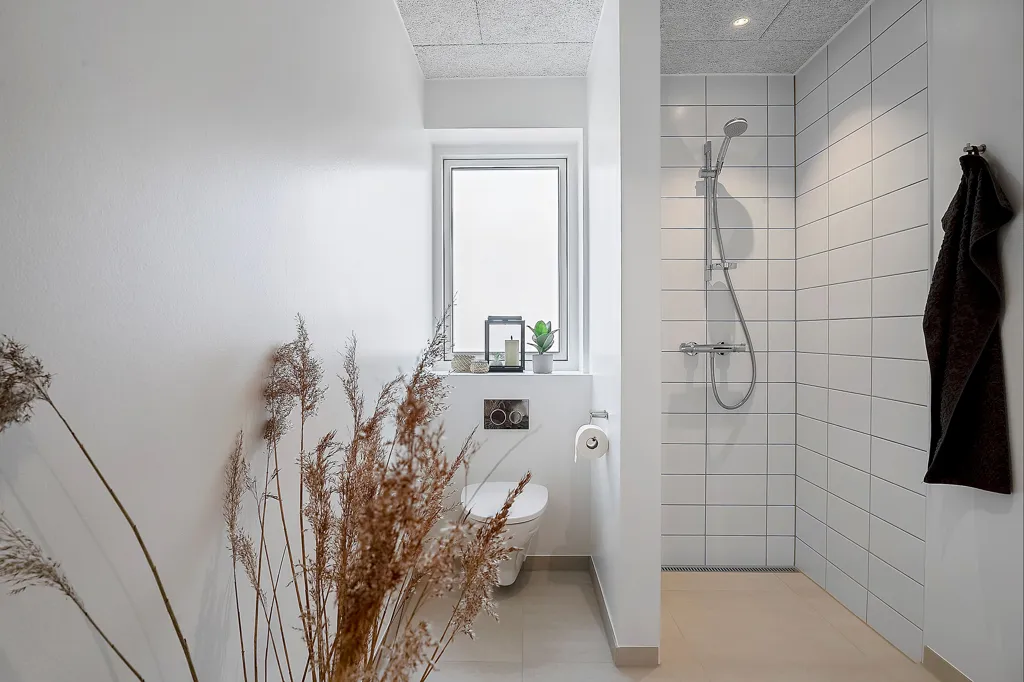Vannitoad - Contemporary Row House with Garden in Juelsminde