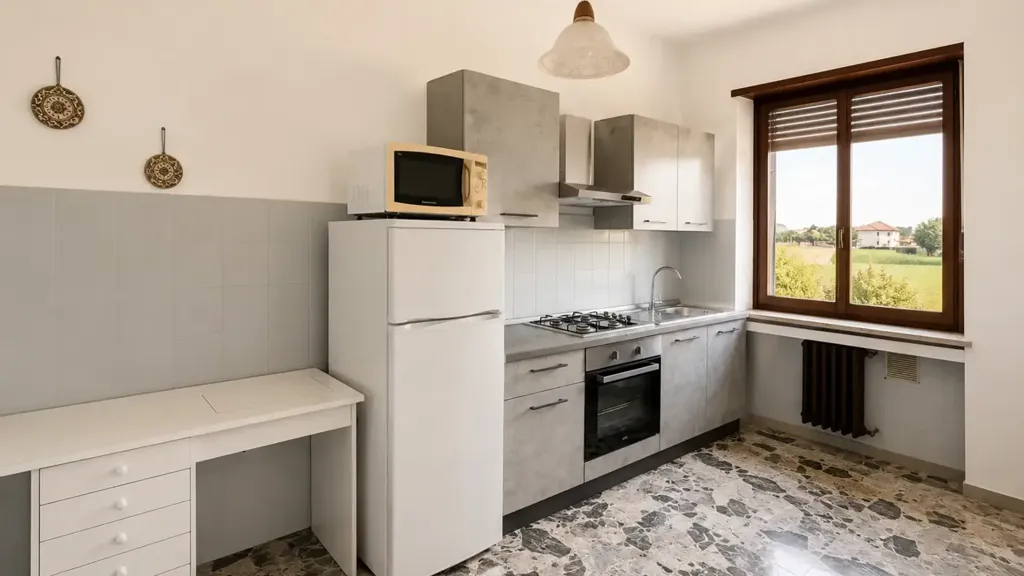 Kitchen - Spacious Apartment with Private Garden in Druento