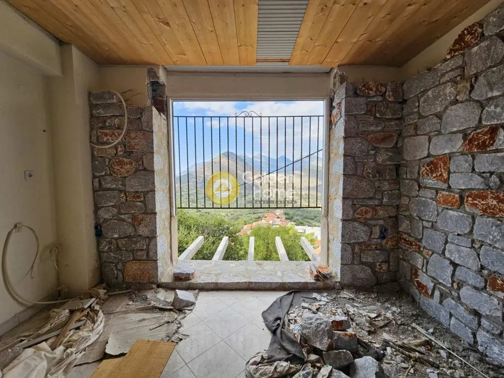 Toad - Two-Storey Stone Villa with Sea View in Vathý