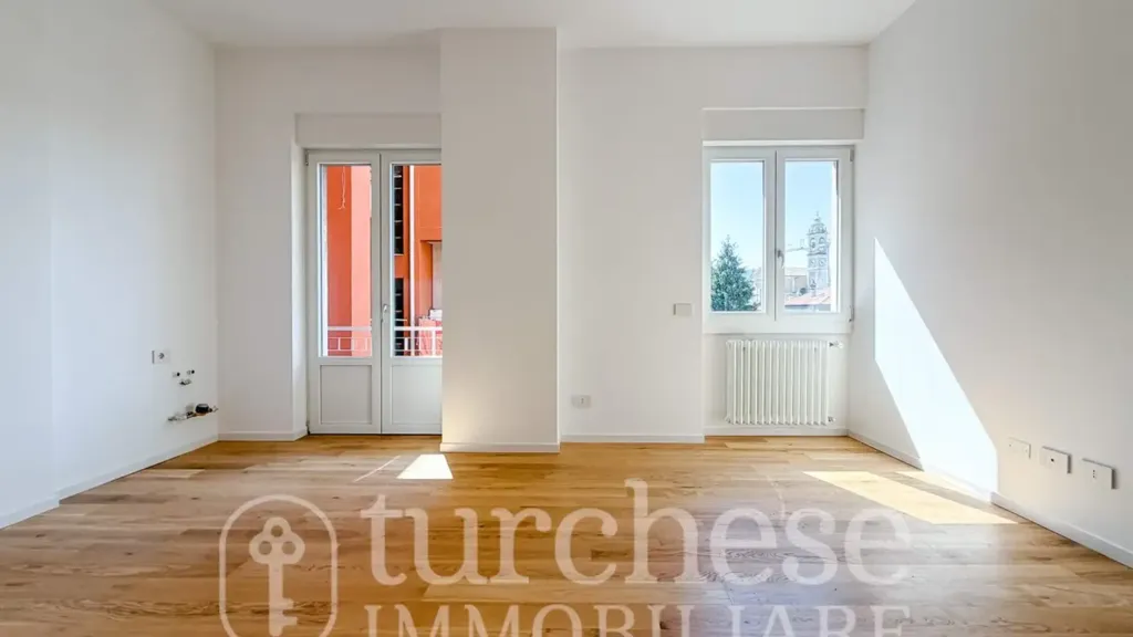 Living Room - Modernised Two-Bedroom Apartment in Bergamo