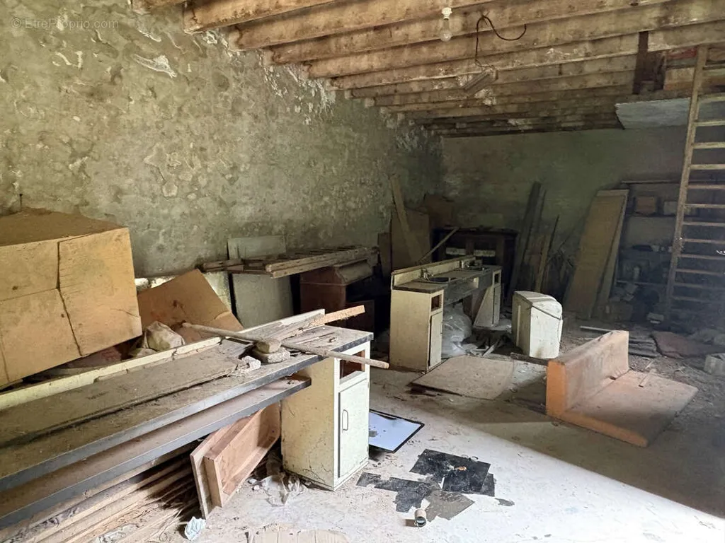 Utility Room - Mixed-Use Building with Commercial Potential in Saint Yrieix