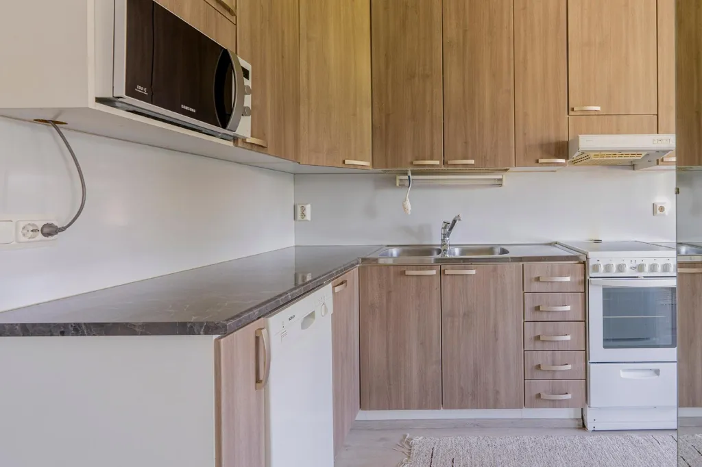 Kitchen - Compact Terraced House with Garden in Nilsiä