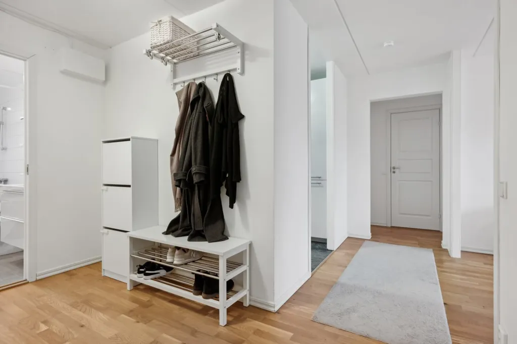 Esik - Modern Corner Apartment with Glass Balcony in Helsingborg