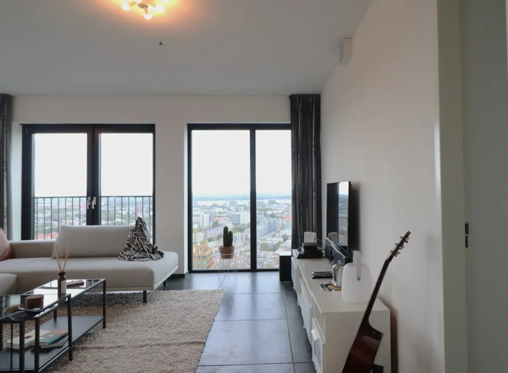 Living Room - Furnished Apartment with City View in Rotterdam