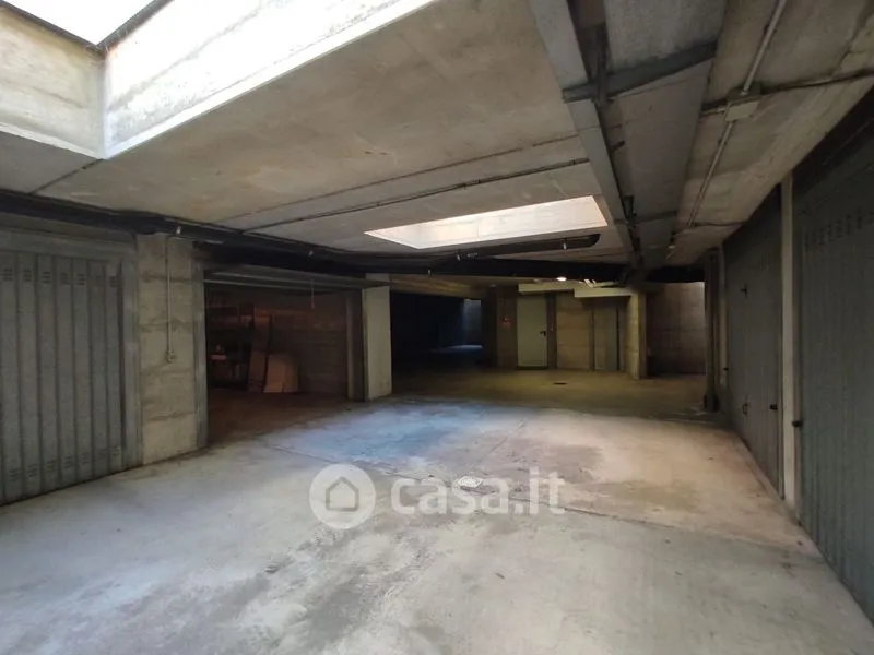 Garage - Two-Level Apartment with Balcony in Bergamo