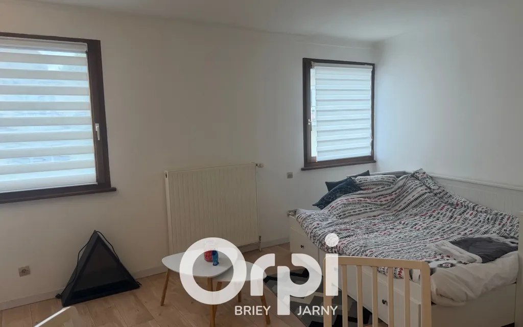 Chambres - Appartement meublé au rez-de-chaussée à Briey