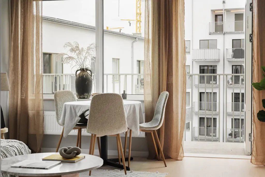 Séjour - Apartment with Balcony and Garden View in Malmö