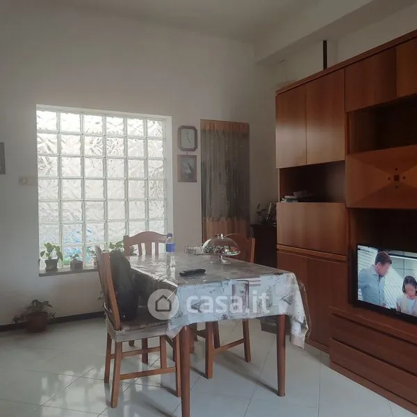Séjour - Three-Bedroom Apartment with Private Courtyard in Bari