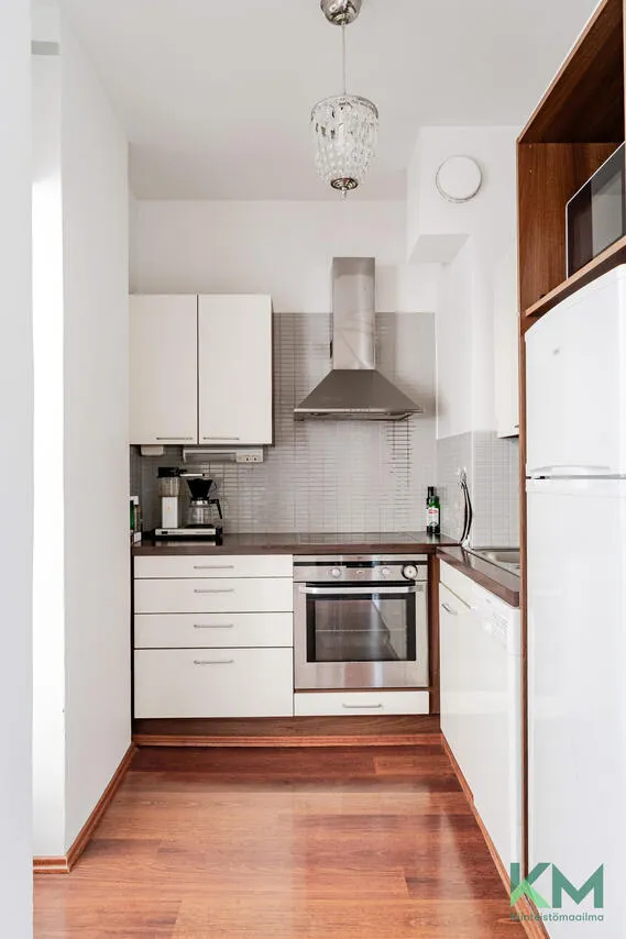 Kitchen - Upper Floor Apartment with Park View in Töölö