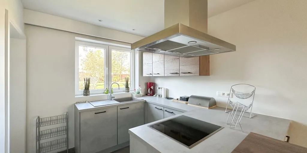 Cuisine - Appartement Charmant avec Garage à Heusden
