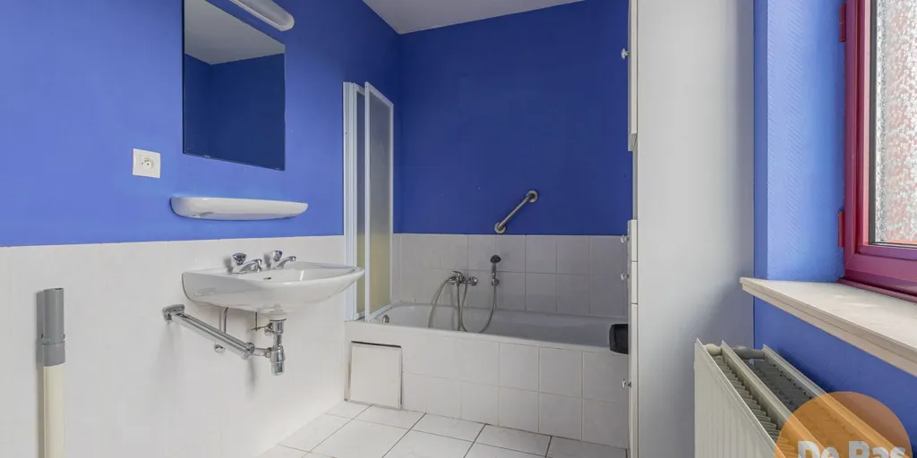 Salles de bain - Appartement avec Vue sur la Place du Marché à Herzele