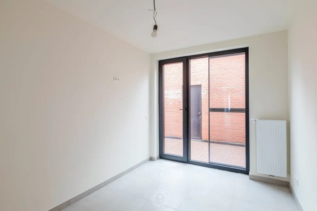 Pièces - Appartement au Rez-de-Chaussée avec Terrasse dans le Centre-Ville