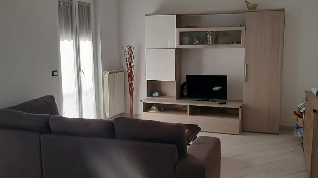 Living Room - Modernised Apartment with Balconies in Loano